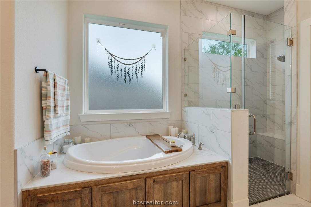 4357 Fox River Lane Bryan, TX 77802 - Photo 18 of 24 a bathroom with a sink and a mirror