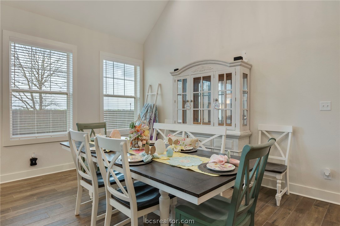 4357 Fox River Lane Bryan, TX 77802 - Photo 7 of 24 a view of a dining room with furniture window and wooden floor