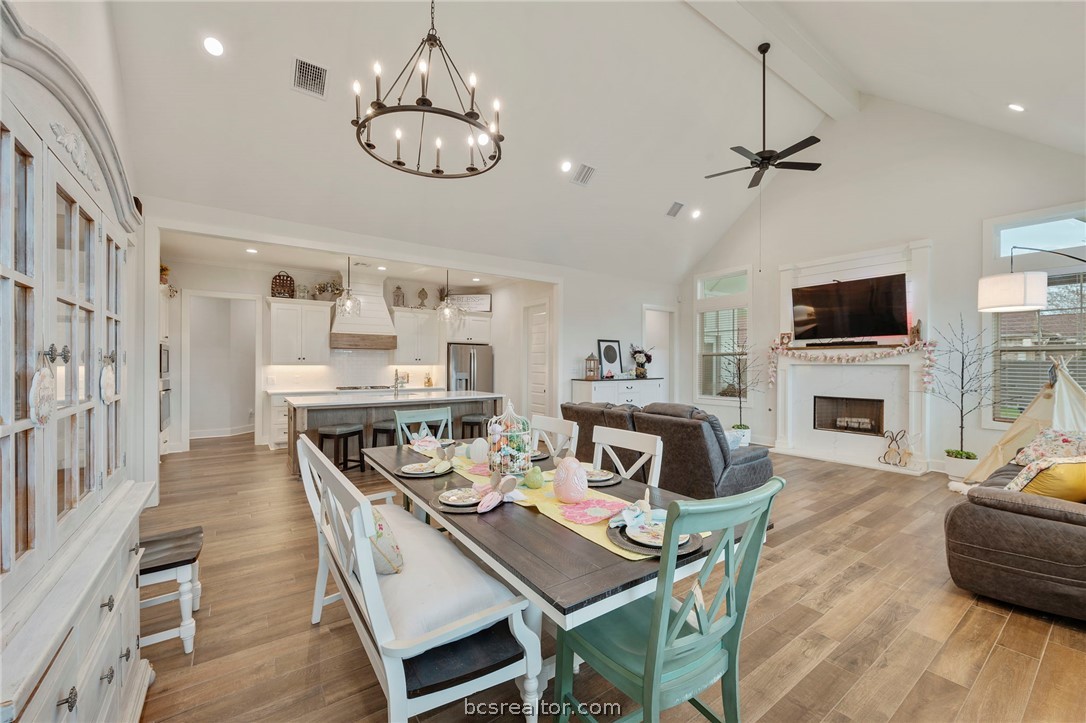 4357 Fox River Lane Bryan, TX 77802 - Photo 23 of 24 a living room with fireplace furniture and a flat screen tv