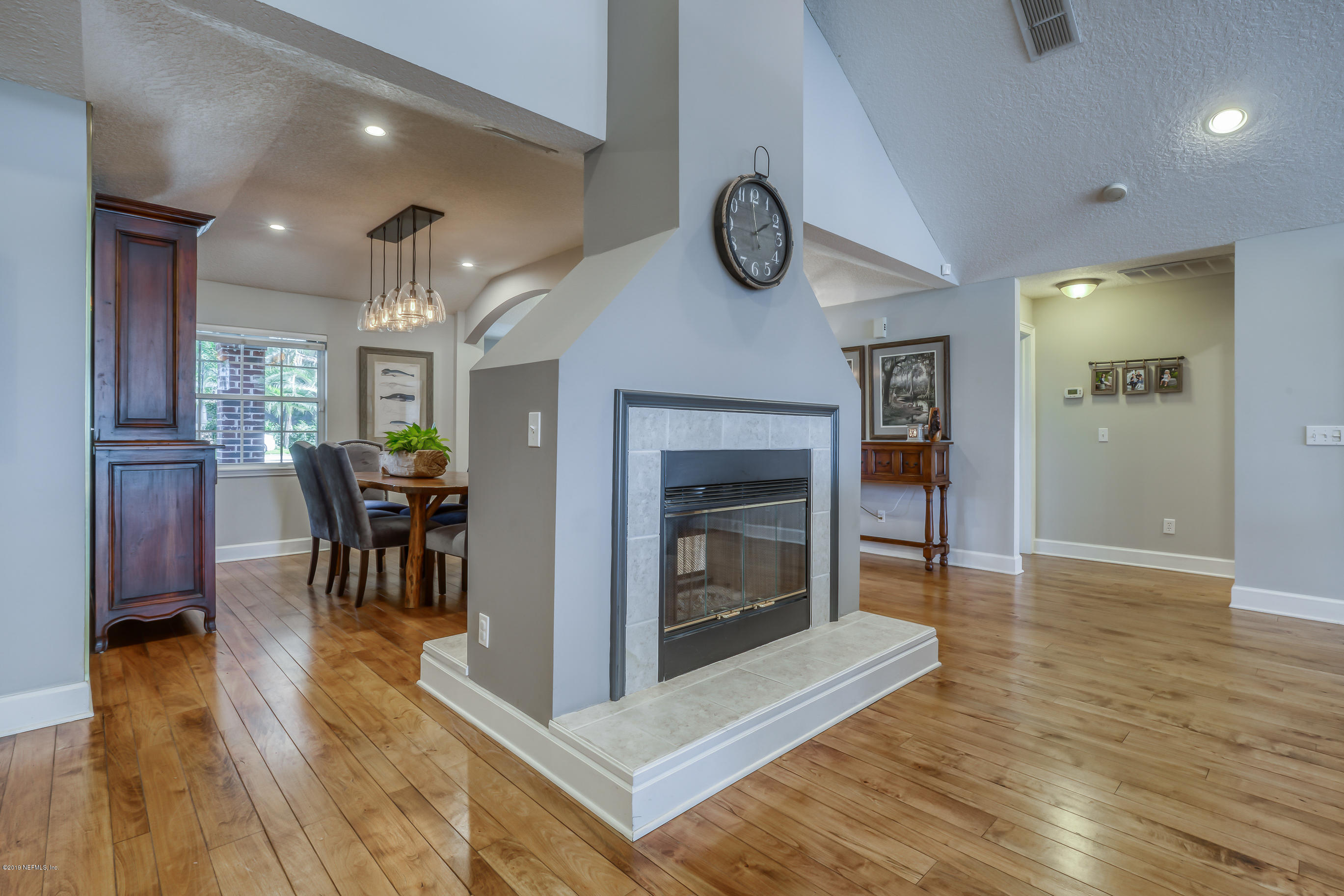 1105 Popolee Road St. Johns, FL 32259 - Photo 18 of 81 a view of a livingroom with furniture and a fireplace