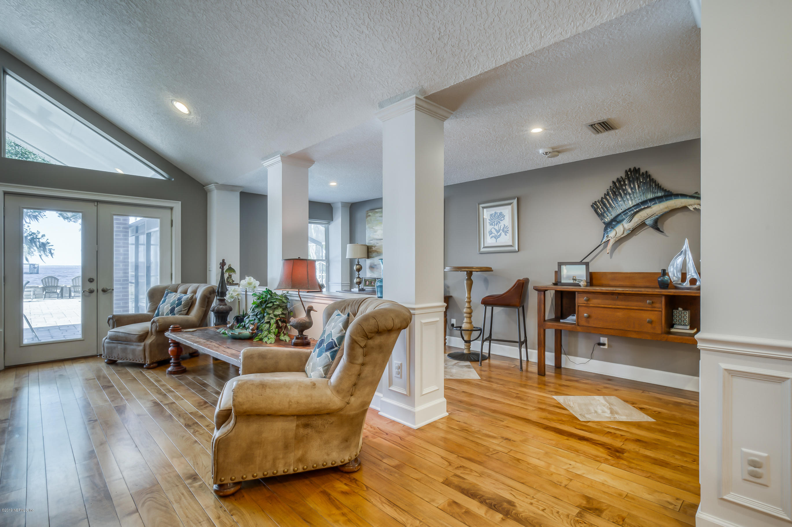 1105 Popolee Road St. Johns, FL 32259 - Photo 19 of 81 a living room with furniture and wooden floor