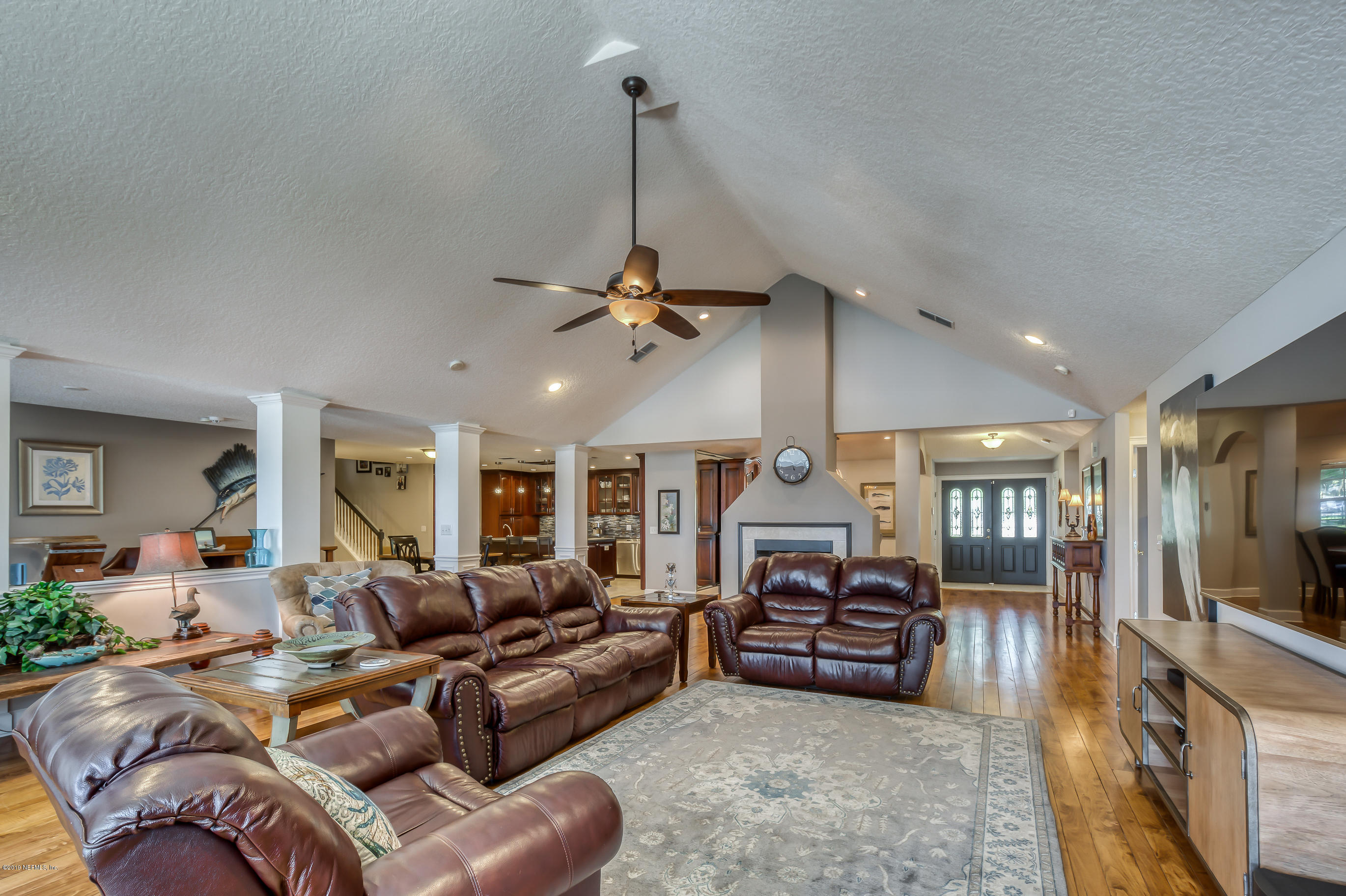 1105 Popolee Road St. Johns, FL 32259 - Photo 28 of 81 a living room with furniture and a flat screen tv