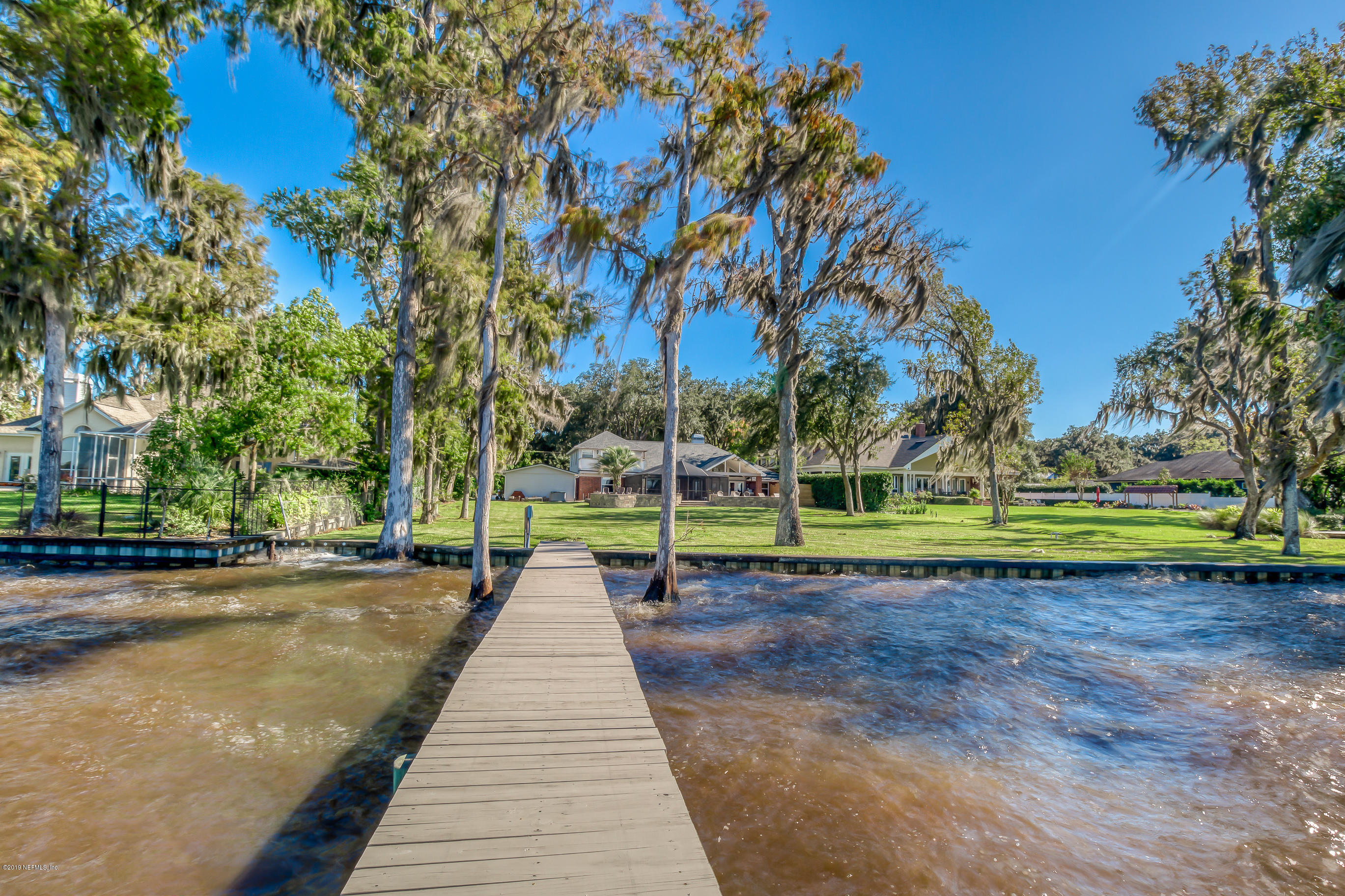 1105 Popolee Road St. Johns, FL 32259 - Photo 6 of 81 a view of a park with large trees