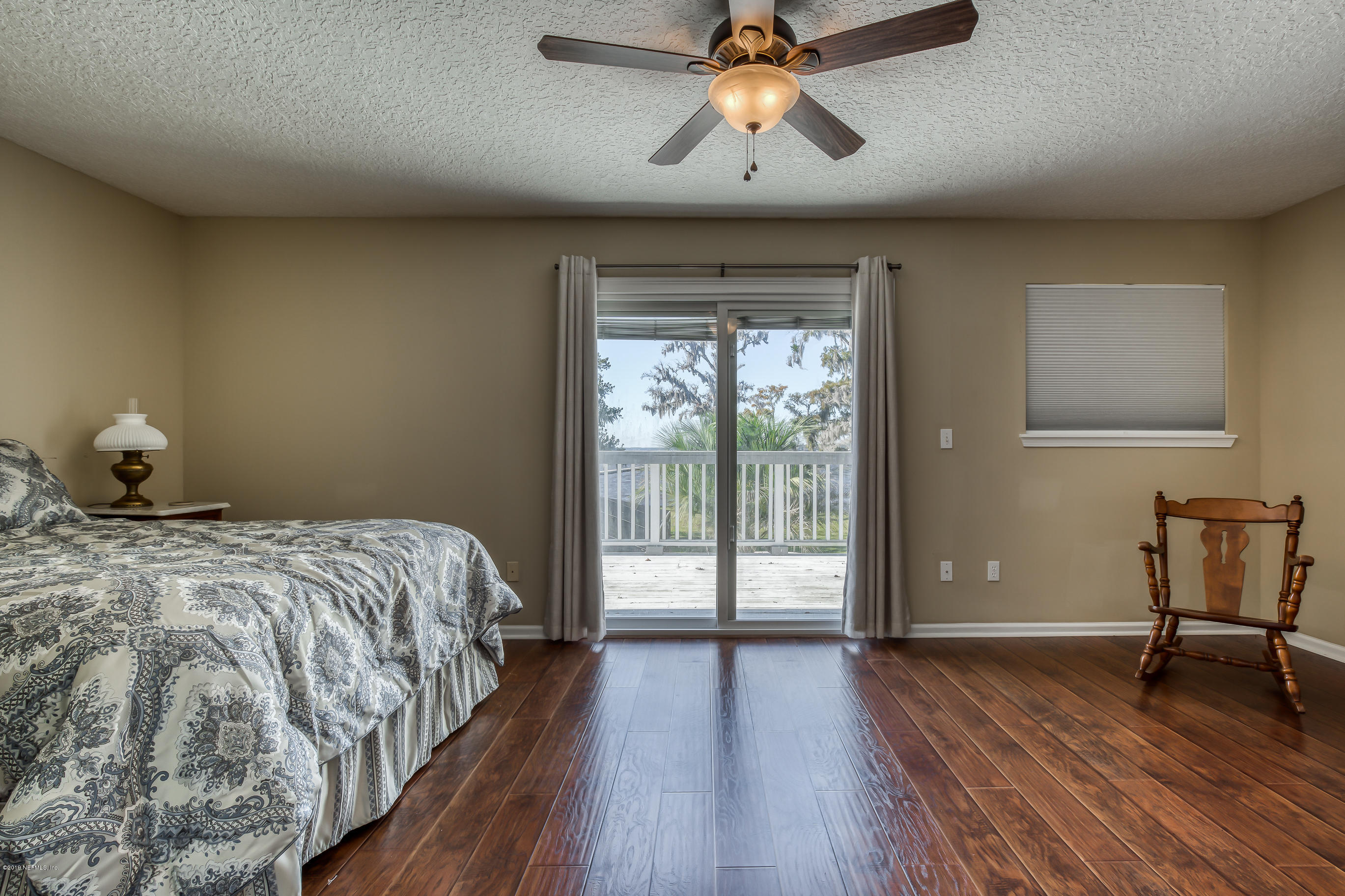 1105 Popolee Road St. Johns, FL 32259 - Photo 64 of 81 a bedroom with a bed and a window