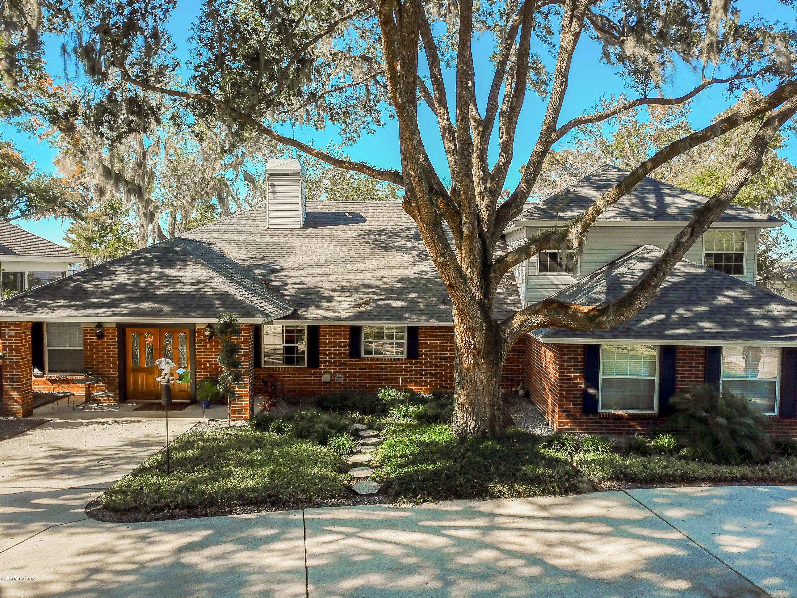 1105 Popolee Road St. Johns, FL 32259 - Photo 66 of 81 a front view of a house with garden