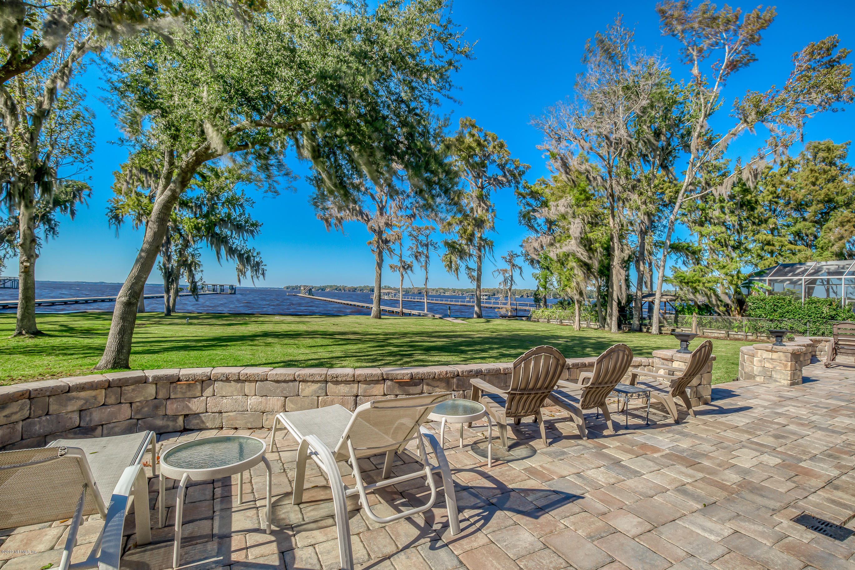 1105 Popolee Road St. Johns, FL 32259 - Photo 9 of 81 a view of a chair and table on the patio