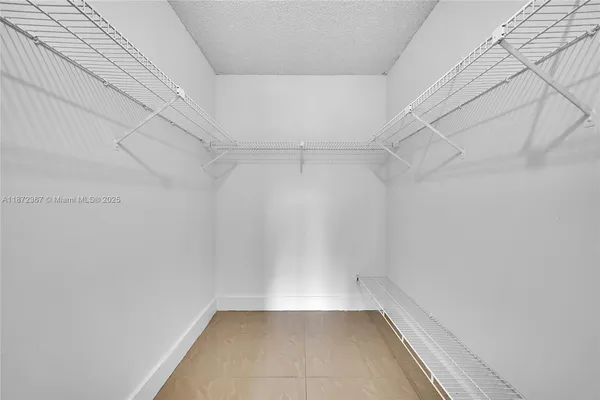 a view of a room with racks on the wall