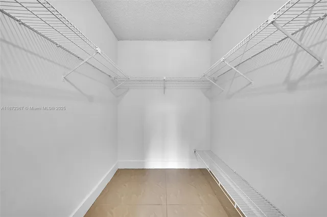 a view of a room with racks on the wall