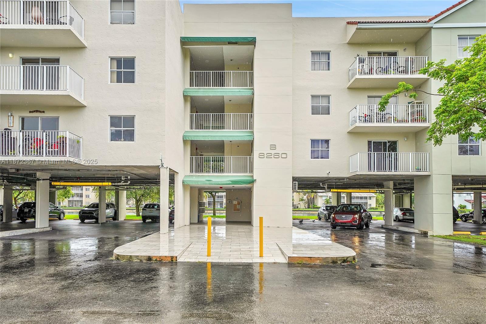 8260 Southwest 210th Street, Unit 201 Cutler Bay, FL 33189 - Photo 31 of 33 a view of building with street view