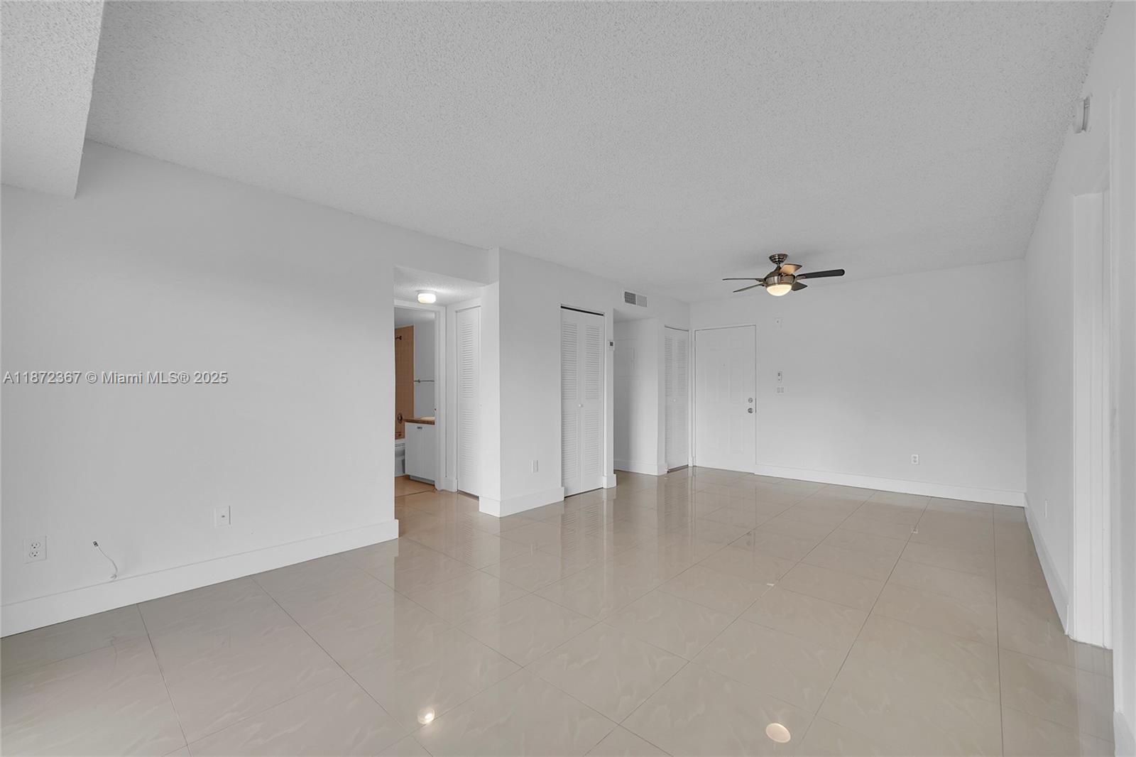 8260 Southwest 210th Street, Unit 201 Cutler Bay, FL 33189 - Photo 10 of 33 a view of an empty room