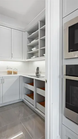 a view of an empty walk in closet