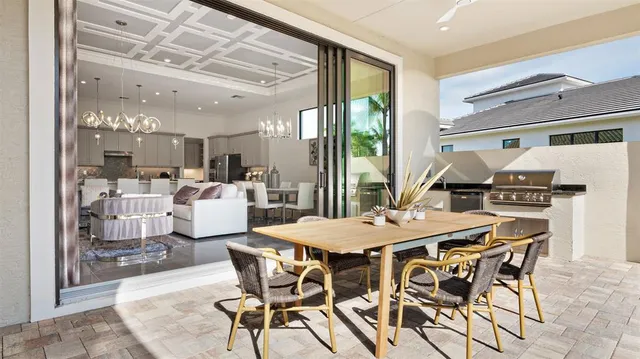 a view of a dining room with furniture and a table