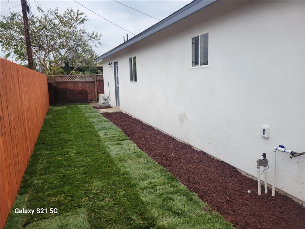 12158 Oracle Street Norwalk, CA 90650 - Photo 21 of 22 a backyard of a house