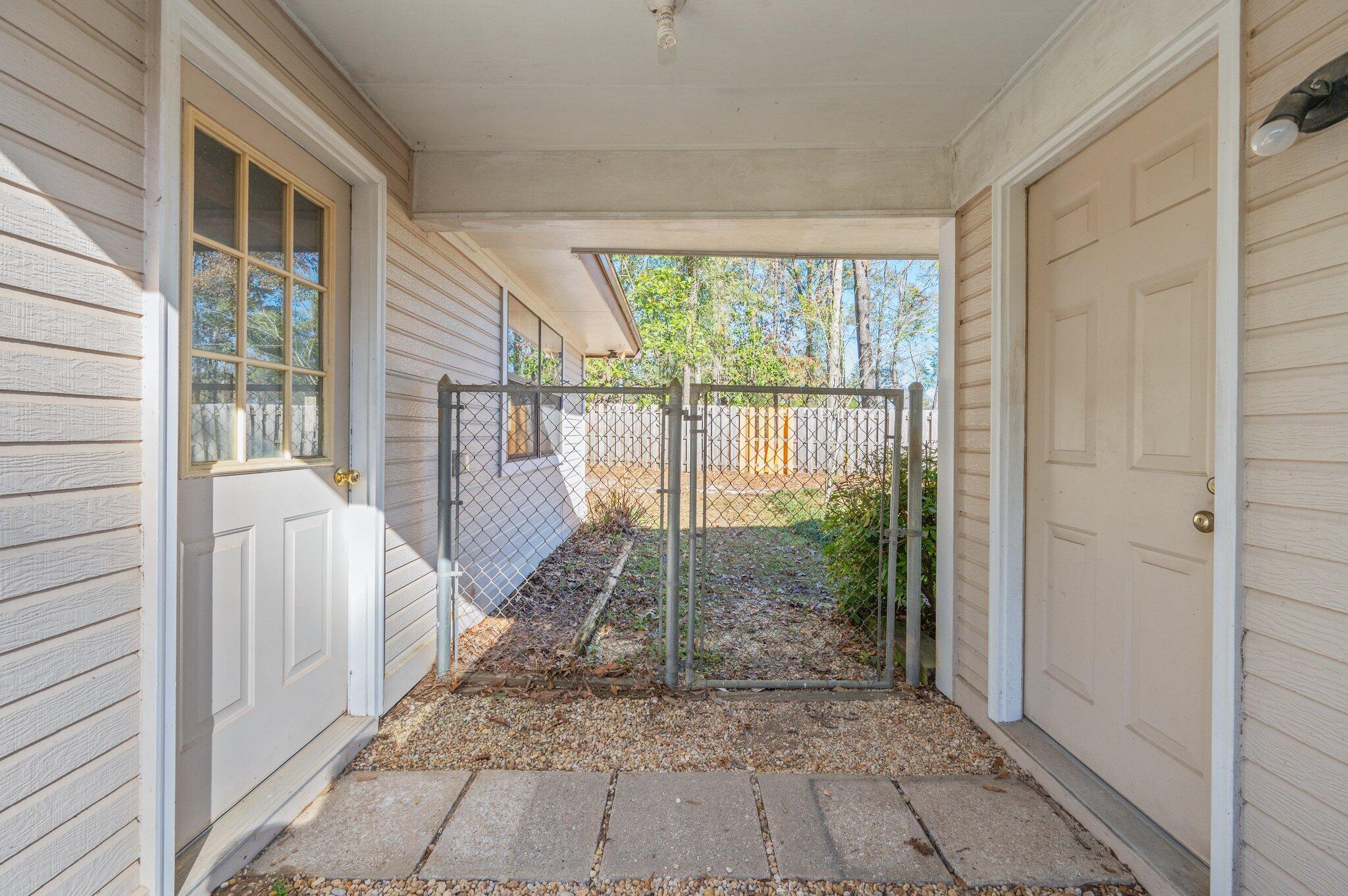 5836 Dairy Road Baker, FL 32531 - Photo 50 of 65 a view of a porch with a backyard