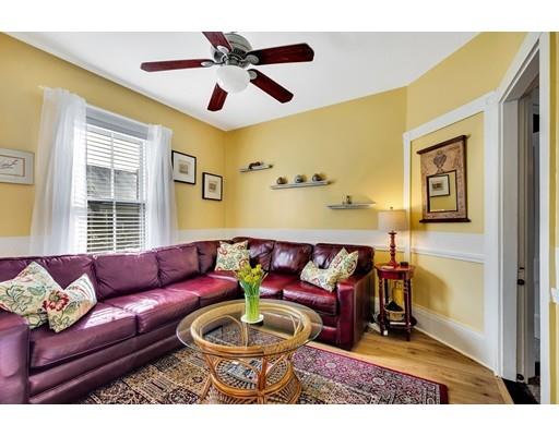 38 Windsor Avenue Acton, MA 01720 - Photo 11 of 30 a living room with furniture and a large window