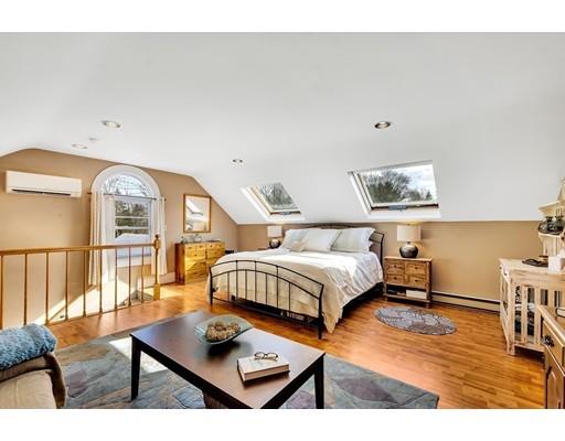 38 Windsor Avenue Acton, MA 01720 - Photo 14 of 30 a bedroom with furniture and a window