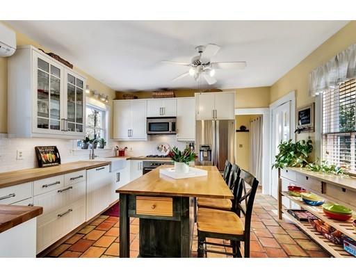38 Windsor Avenue Acton, MA 01720 - Photo 2 of 30 a view of a dining room with furniture and a kitchen