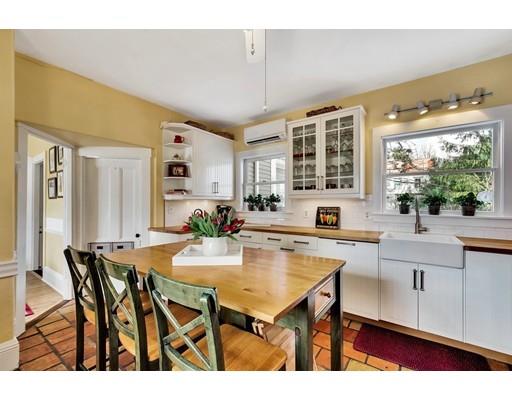 38 Windsor Avenue Acton, MA 01720 - Photo 4 of 30 a view of a dining table chairs and chandelier