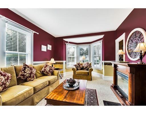 38 Windsor Avenue Acton, MA 01720 - Photo 7 of 30 a living room with furniture and a large window