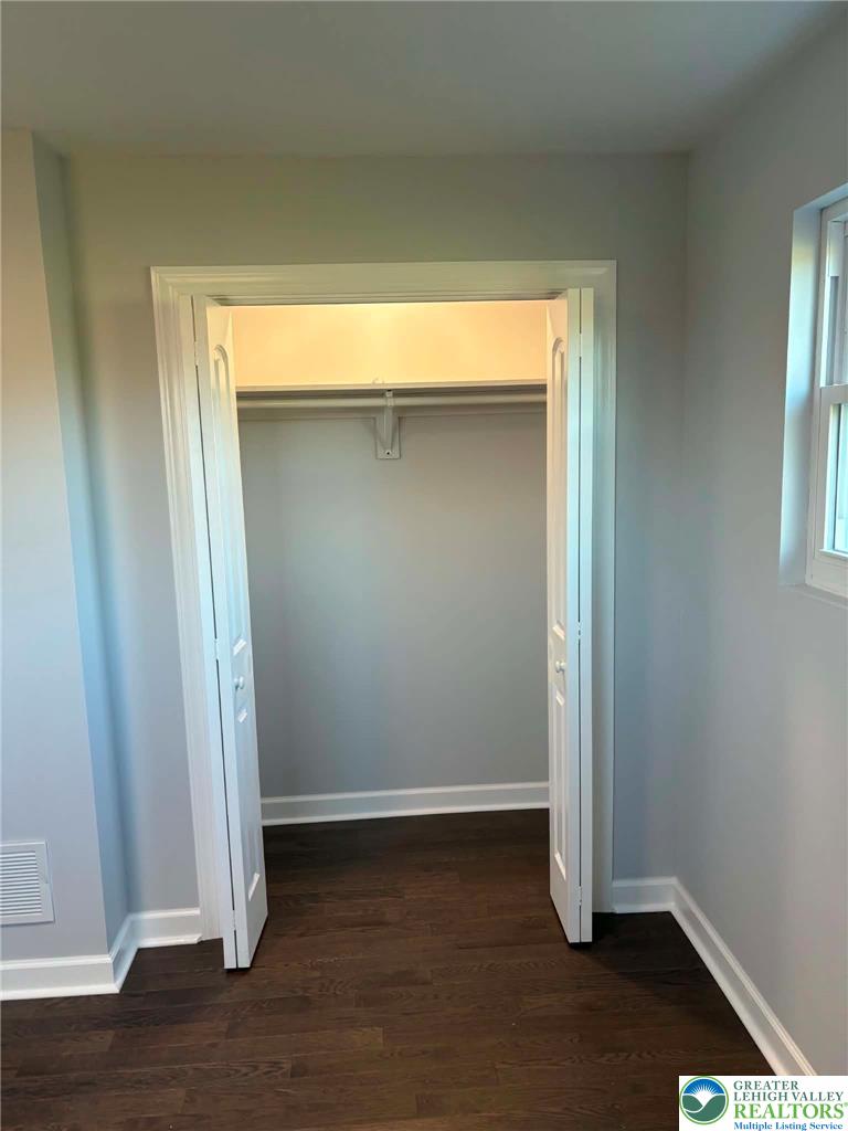 3957 Mountain Road Slatington, PA 18080 - Photo 22 of 33 an empty room with wooden floor and closet