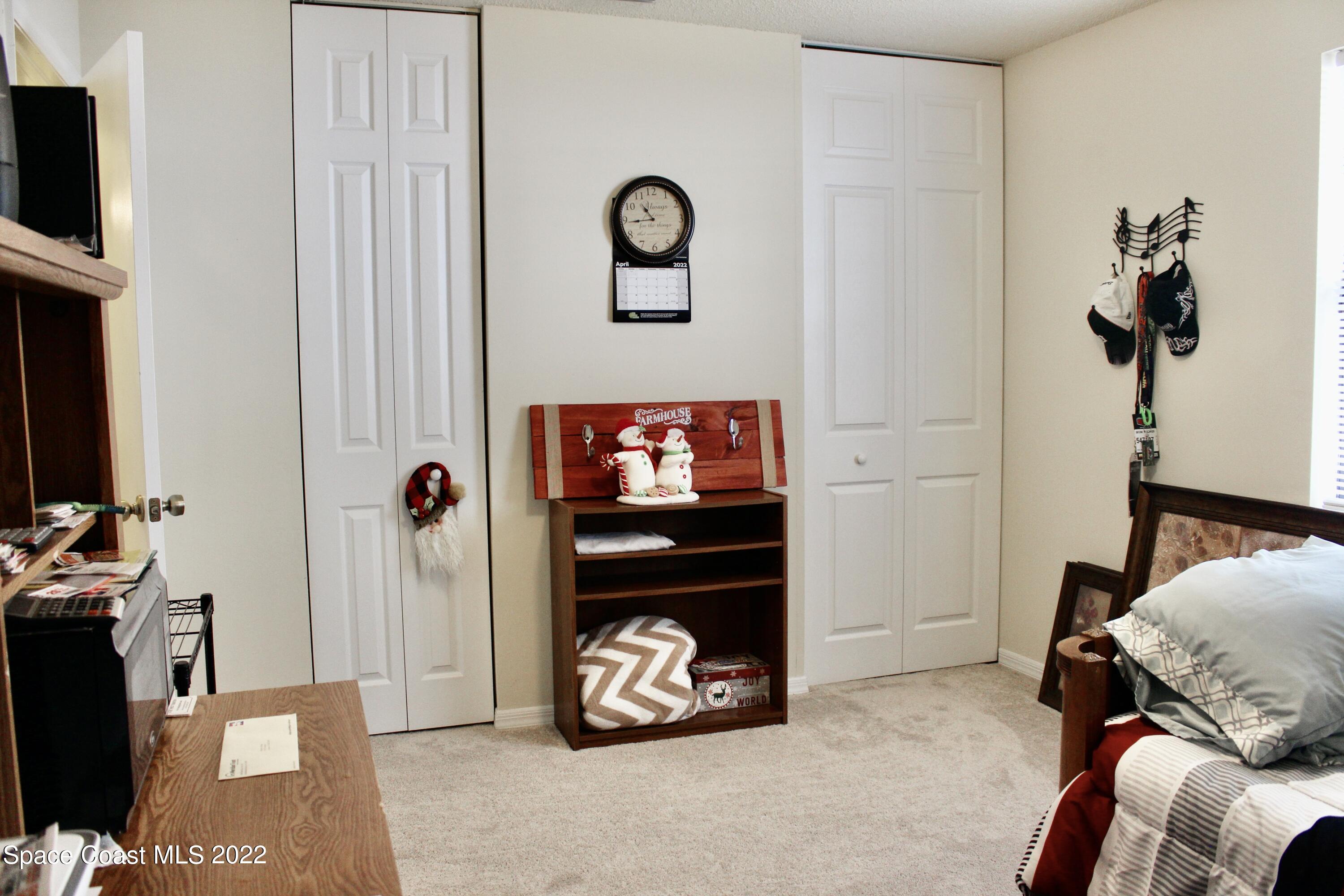 6737 Cecil Road Cocoa, FL 32927 - Photo 21 of 39 a view of livingroom with furniture and a flat screen tv
