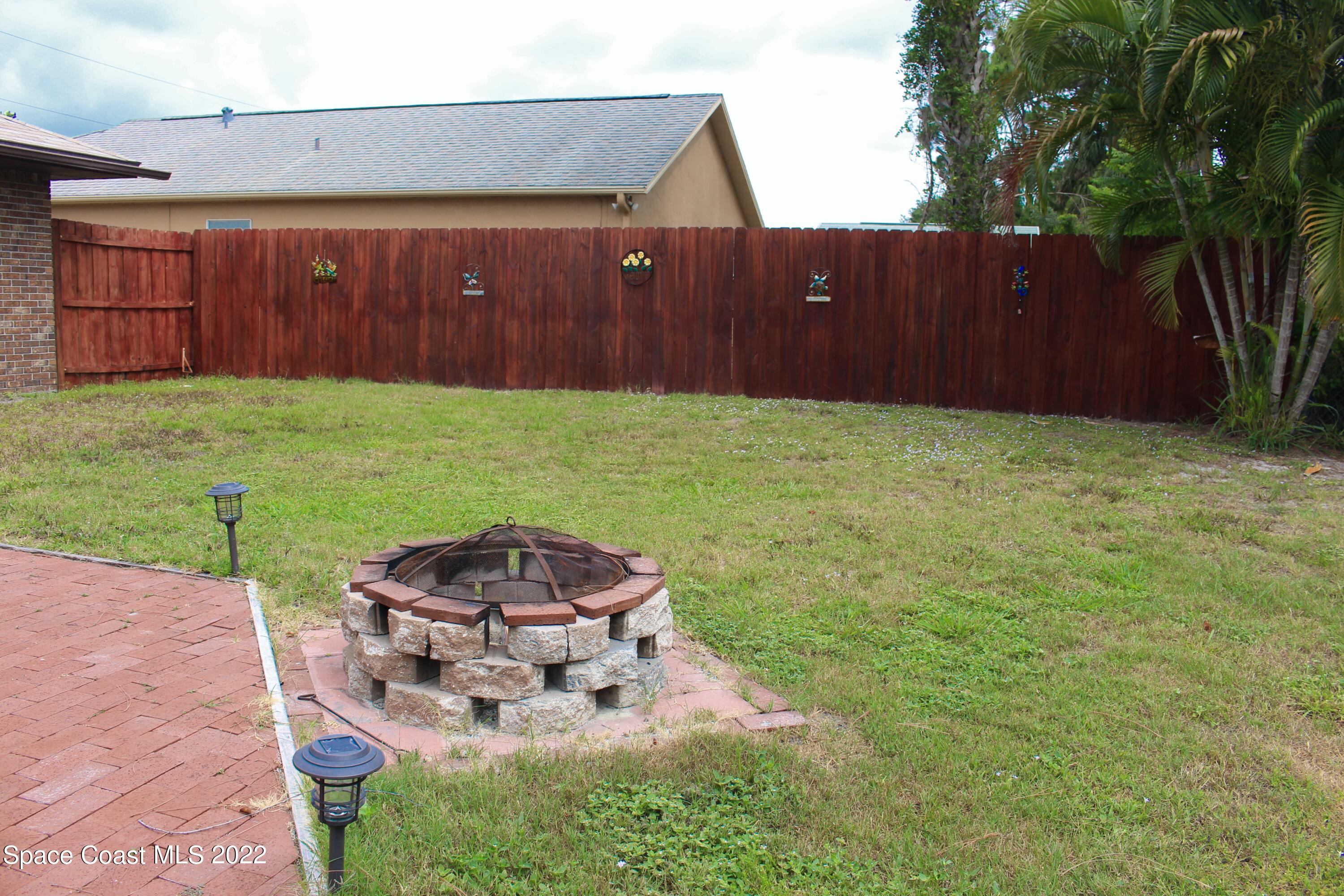 6737 Cecil Road Cocoa, FL 32927 - Photo 37 of 39 a backyard of a house