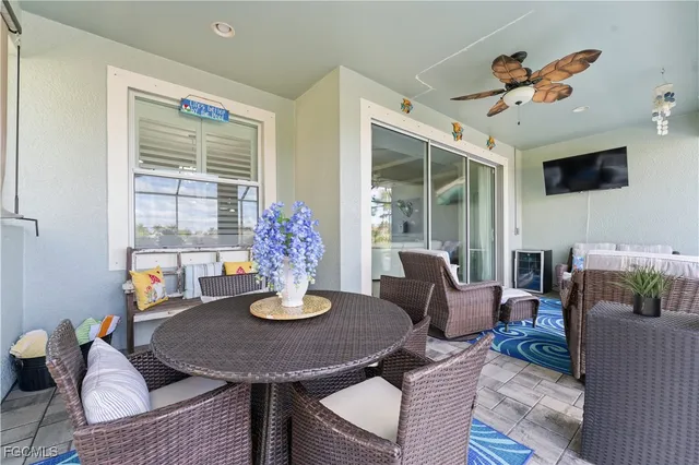 a dining room with furniture and window