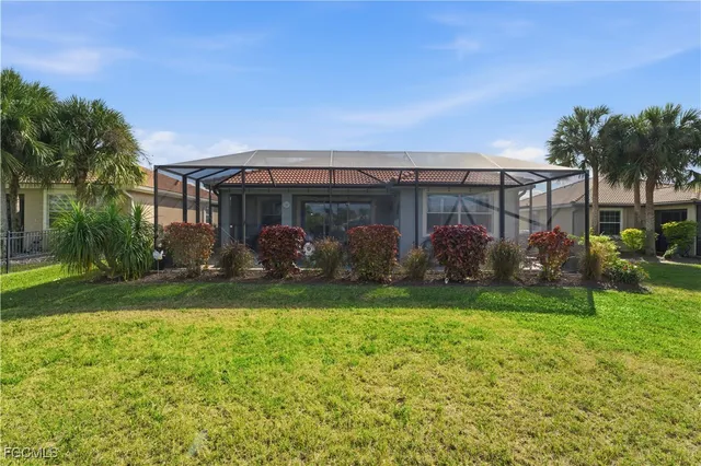 a front view of house with garden
