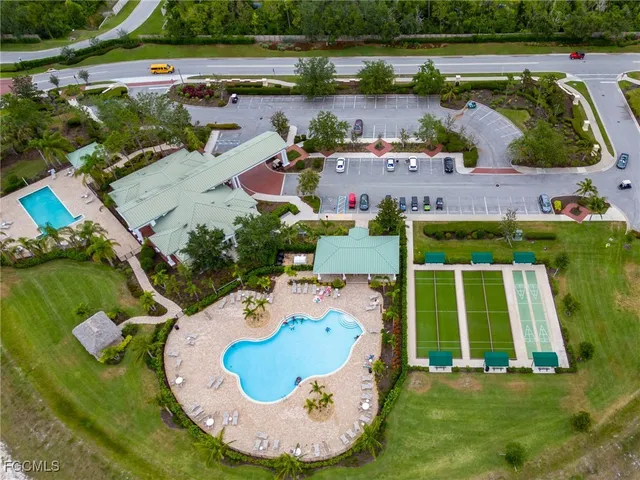 an aerial view of a house with outdoor space swimming pool and outdoor seating