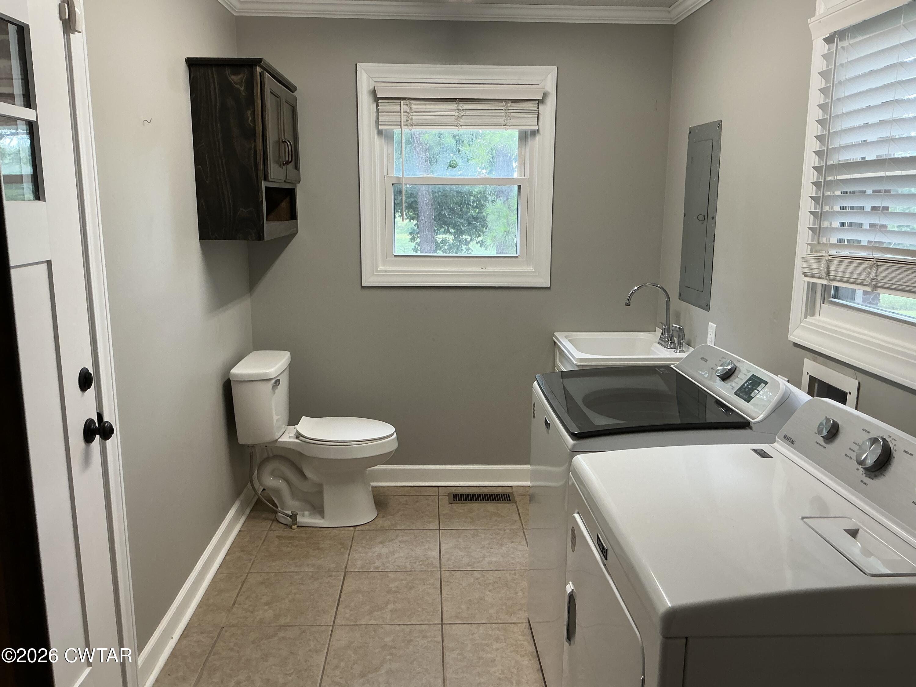 141 Agee Road Friendship, TN 38034 - Photo 9 of 28 Laundry Room & 1/2 Bath