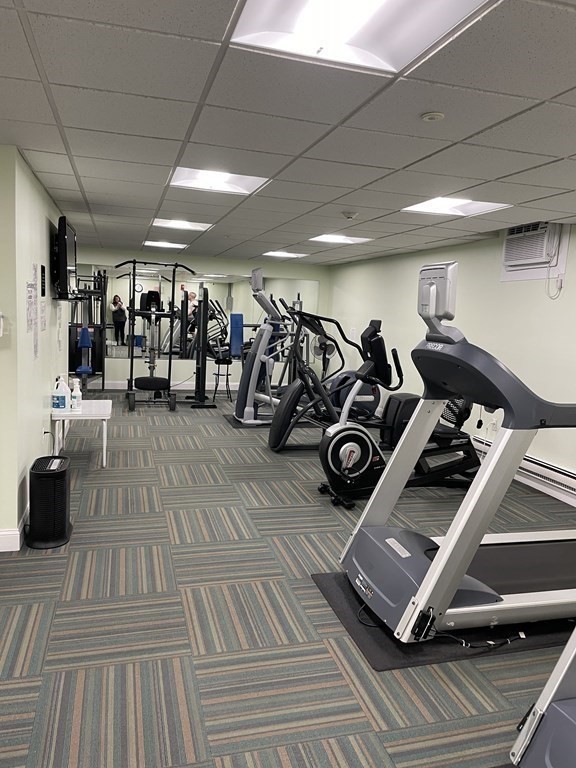 1550 Worcester Road, Unit 114 Framingham, MA 01702 - Photo 19 of 21 a view of a room with gym equipment