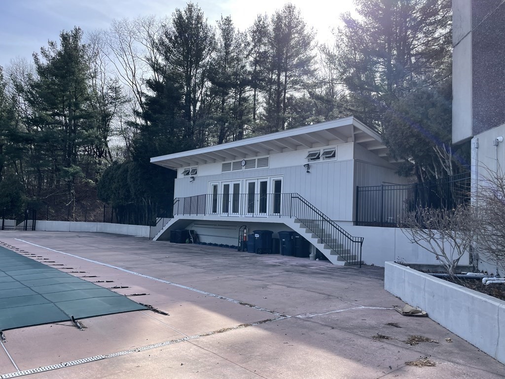 1550 Worcester Road, Unit 114 Framingham, MA 01702 - Photo 21 of 21 a view of a house with a yard