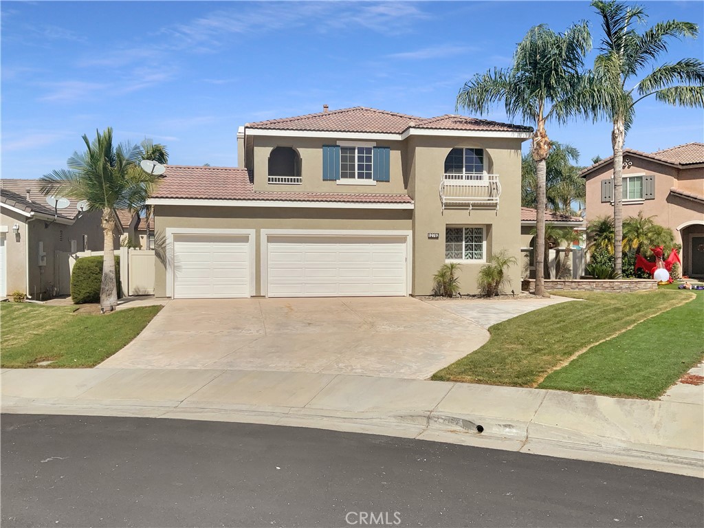 12762 Tarragon Way Riverside, CA 92503 - Photo 1 of 1 a front view of a house with a yard and garage