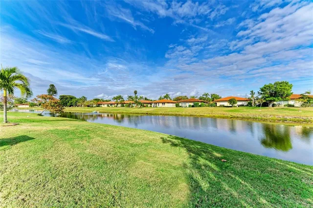 a view of a lake with a houses