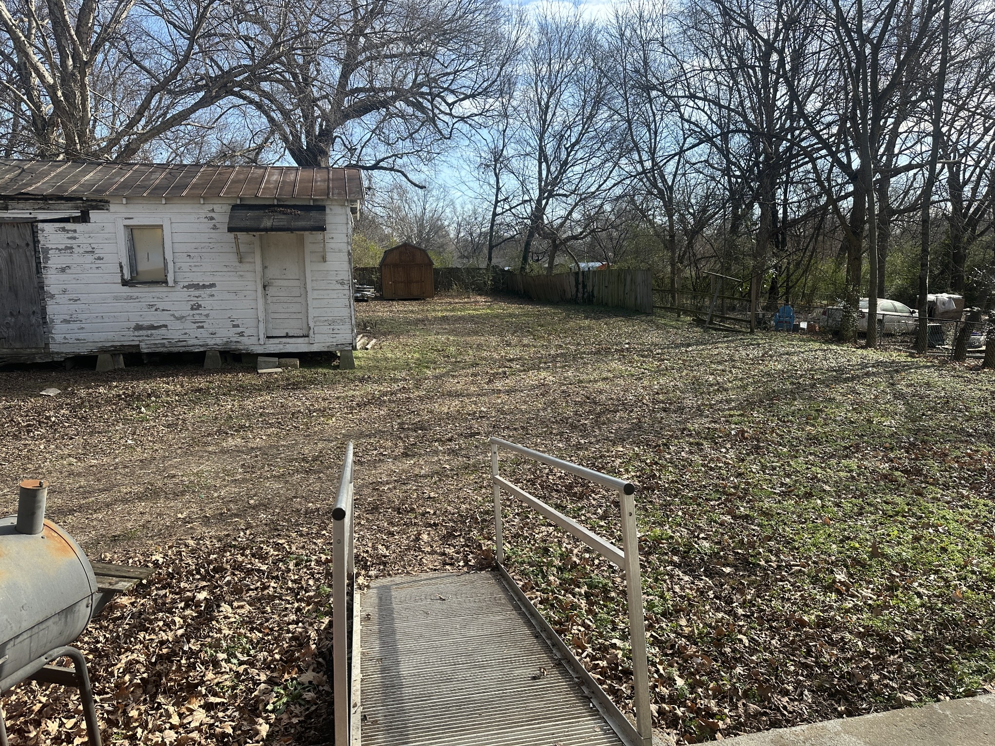 316 North High Street Covington, TN 38019 - Photo 14 of 14 a backyard of a house with lots of green space