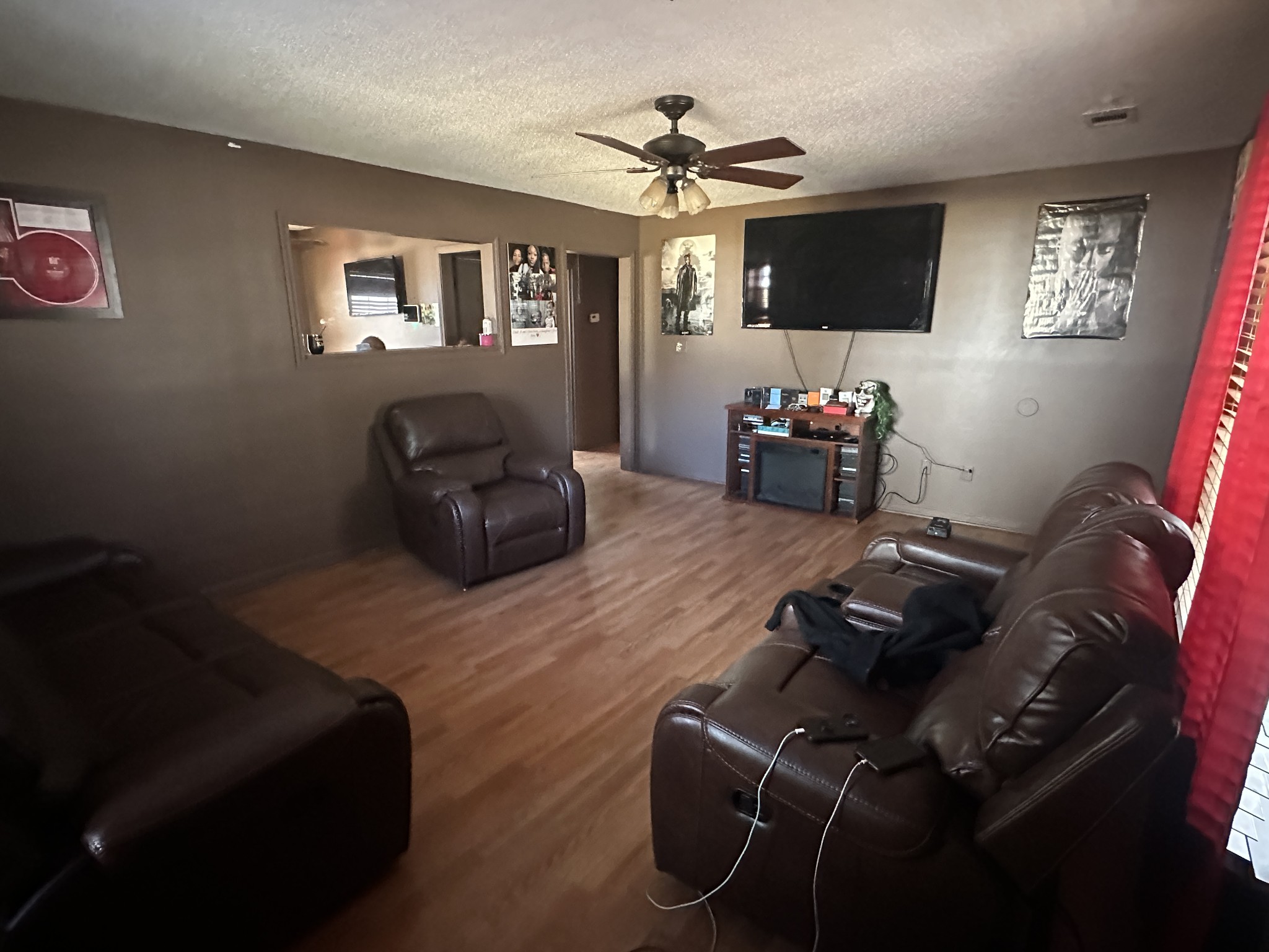 316 North High Street Covington, TN 38019 - Photo 3 of 14 a living room with furniture and a flat screen tv