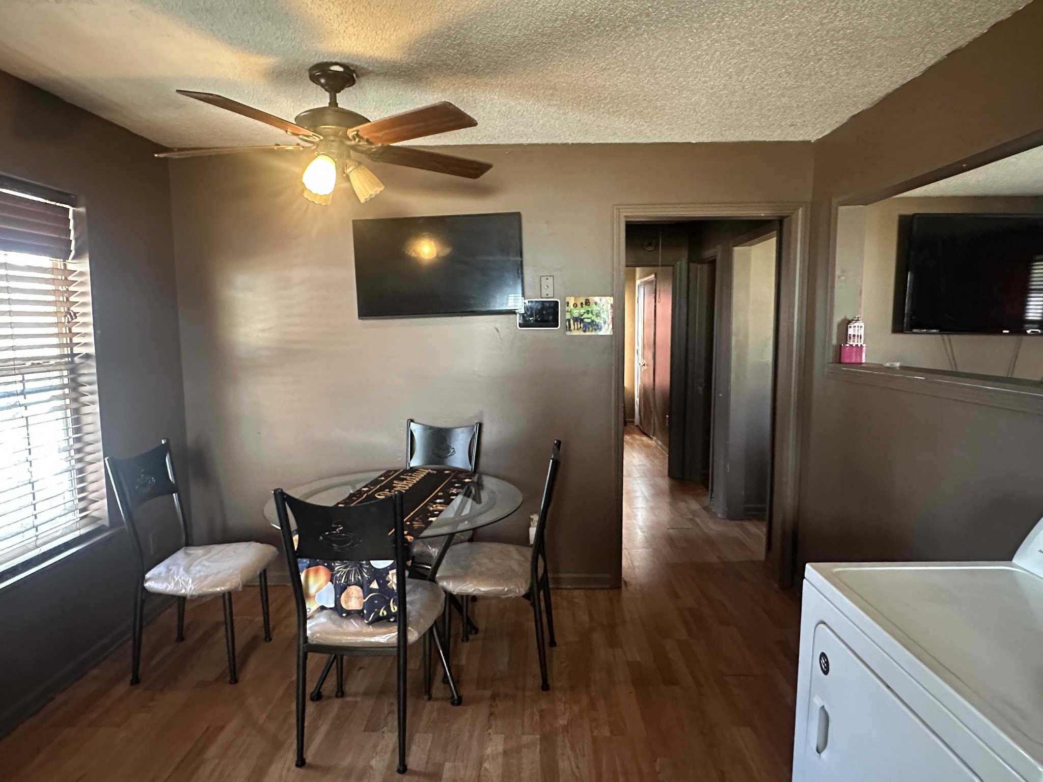 316 North High Street Covington, TN 38019 - Photo 7 of 14 a view of a livingroom with furniture window and wooden floor