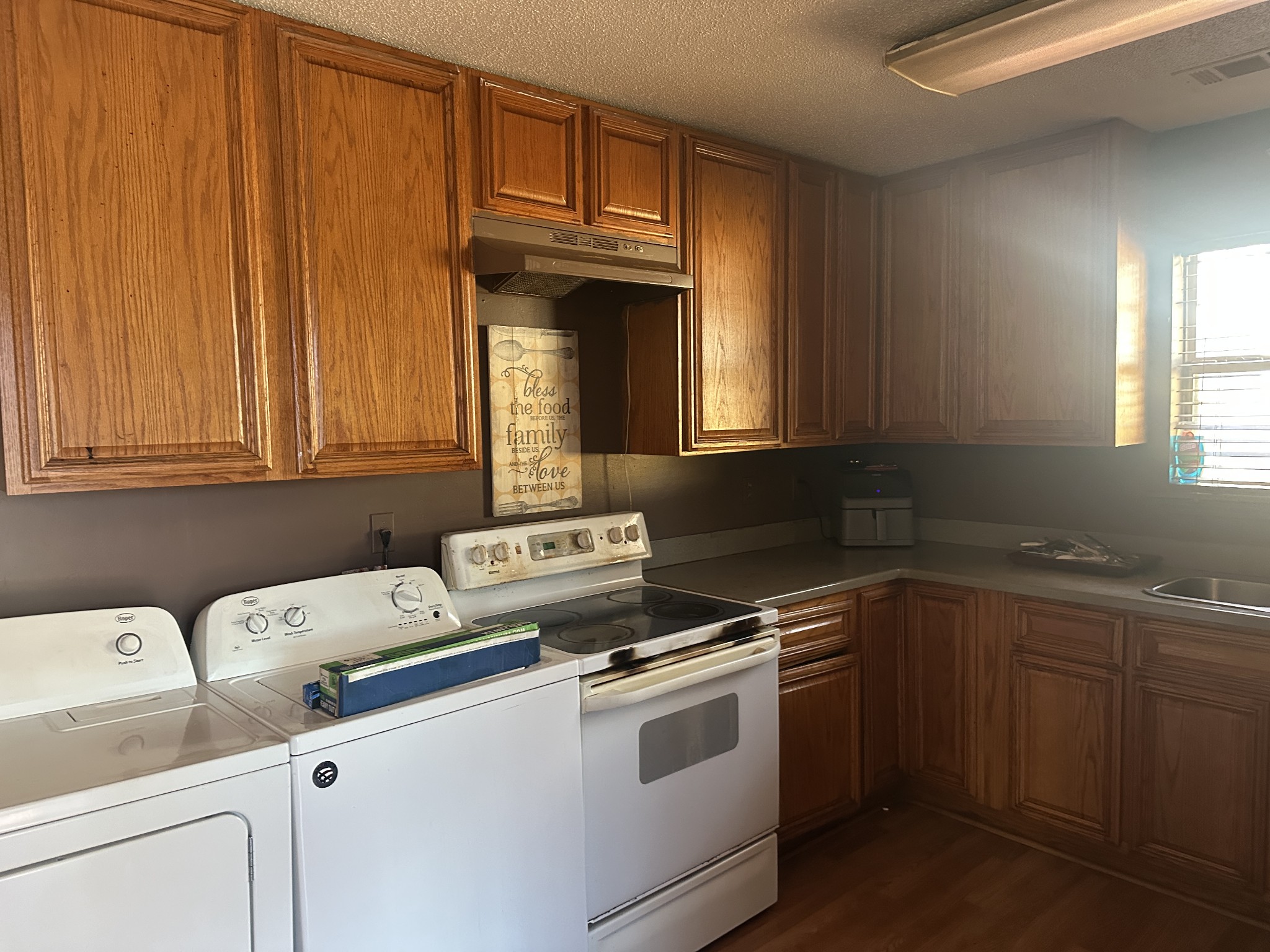 316 North High Street Covington, TN 38019 - Photo 10 of 14 a utility room with dryer and washer