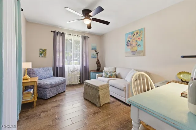 a living room with furniture and a table