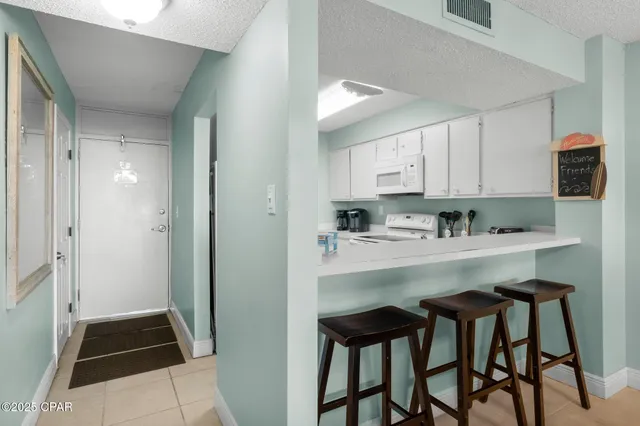 $399,000 | 7205 Thomas Drive, Unit A109, Panama City Beach, FL 32408