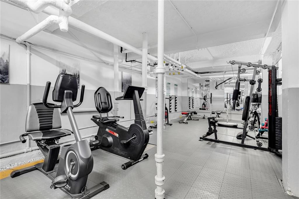 9281 Shore Road, Unit 608 Brooklyn, NY 11209 - Photo 9 of 13 a view of a room with gym equipment