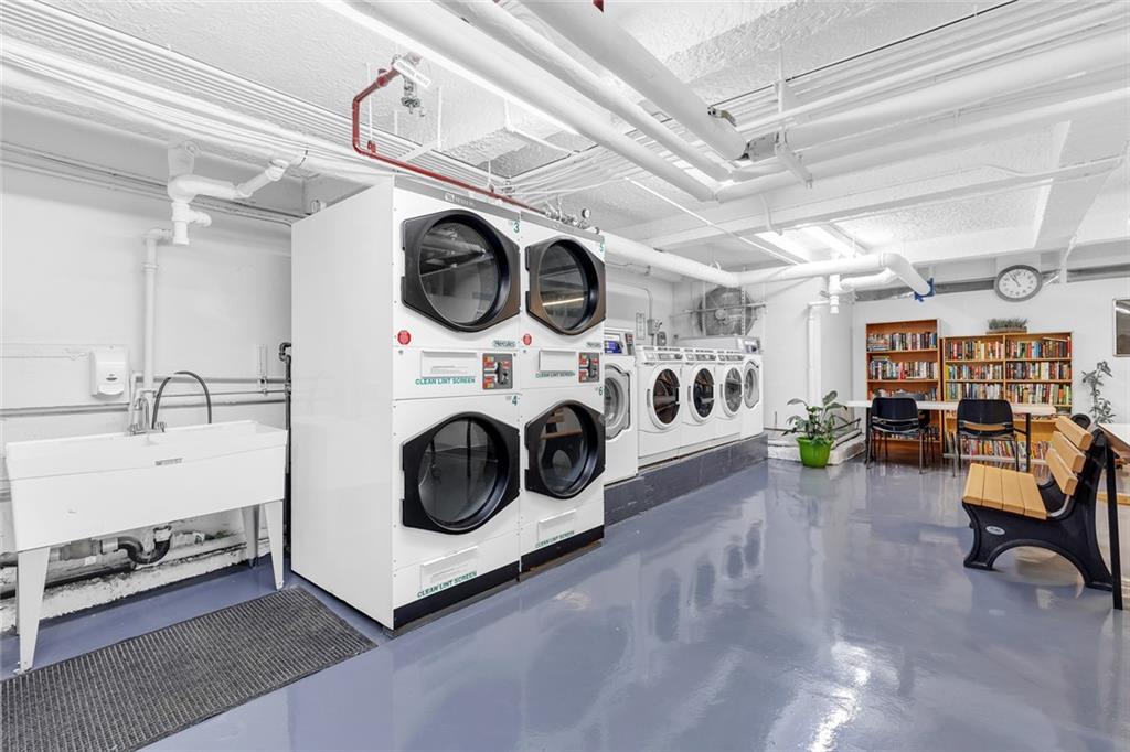 9281 Shore Road, Unit 608 Brooklyn, NY 11209 - Photo 10 of 13 a utility room with dryer and washer