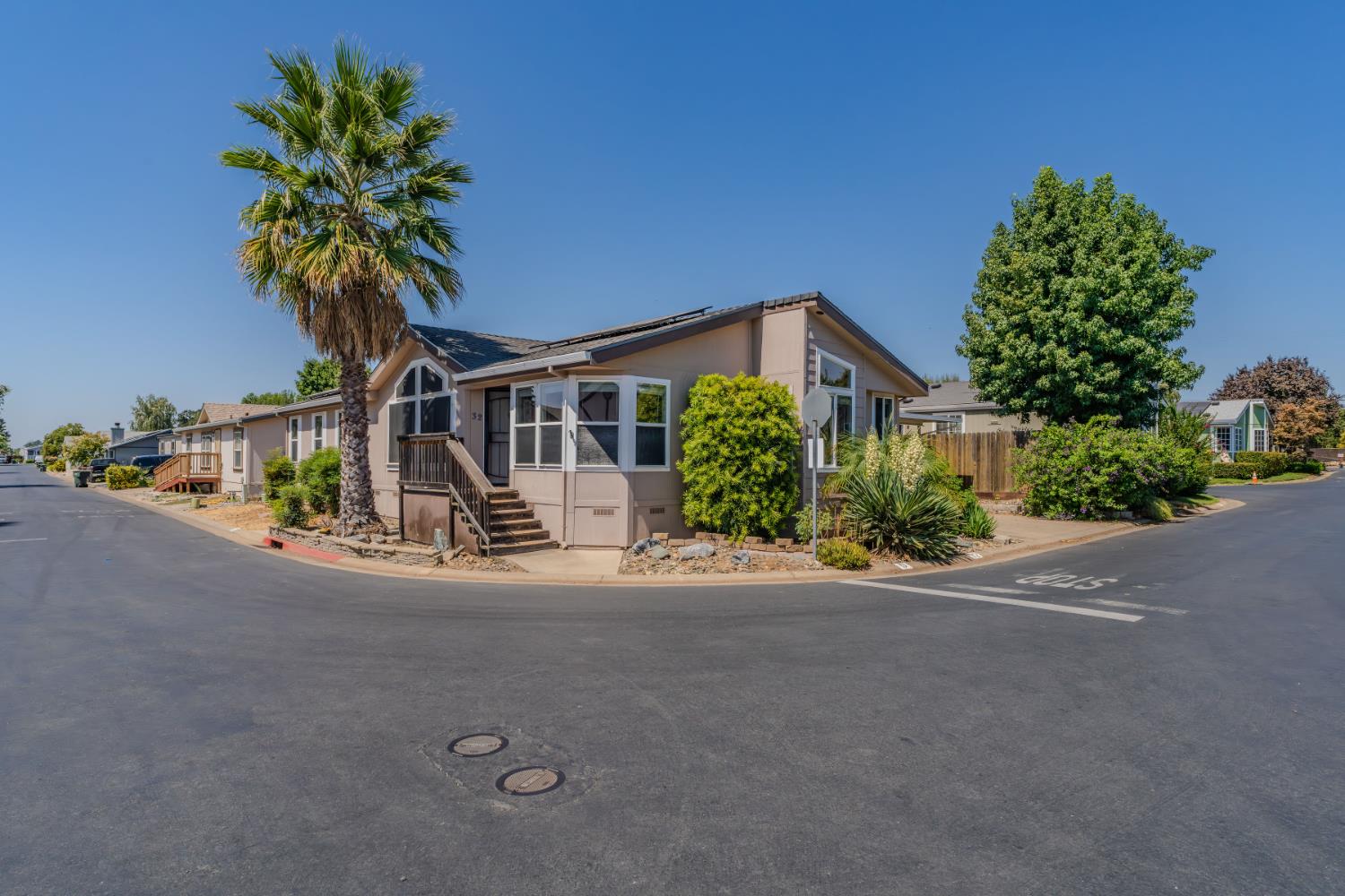 front view of a house with a street