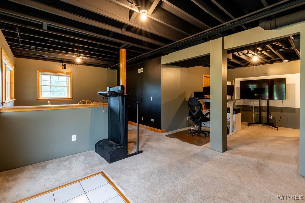 7960 Goodrich Road Clarence, NY 14032 - Photo 28 of 44 Gamer room area that can be used as a fourth bedro