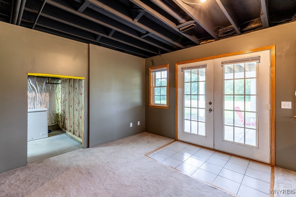 7960 Goodrich Road Clarence, NY 14032 - Photo 31 of 44 Family room area leading out to the lowest level d