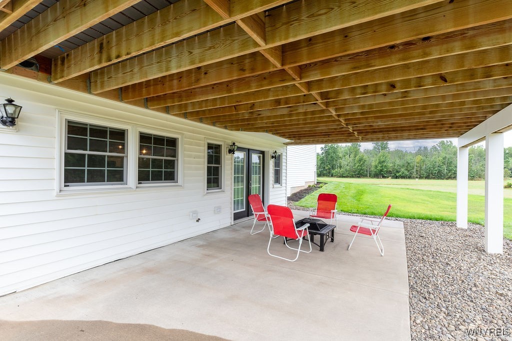7960 Goodrich Road Clarence, NY 14032 - Photo 32 of 44 A view of the lowest level deck.