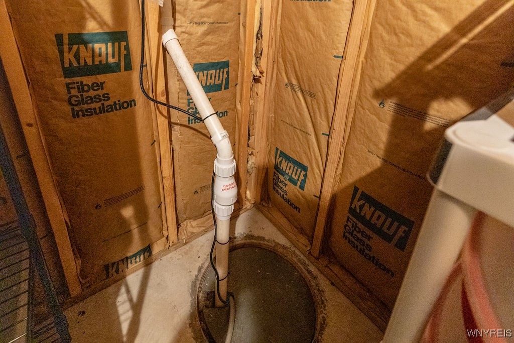 7960 Goodrich Road Clarence, NY 14032 - Photo 35 of 44 Sump pump and storage area.