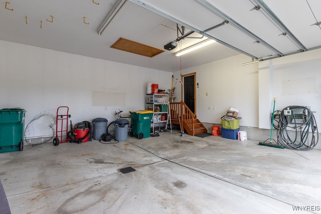7960 Goodrich Road Clarence, NY 14032 - Photo 40 of 44 Nice size Attached 2 1/2 car. Garage with storage