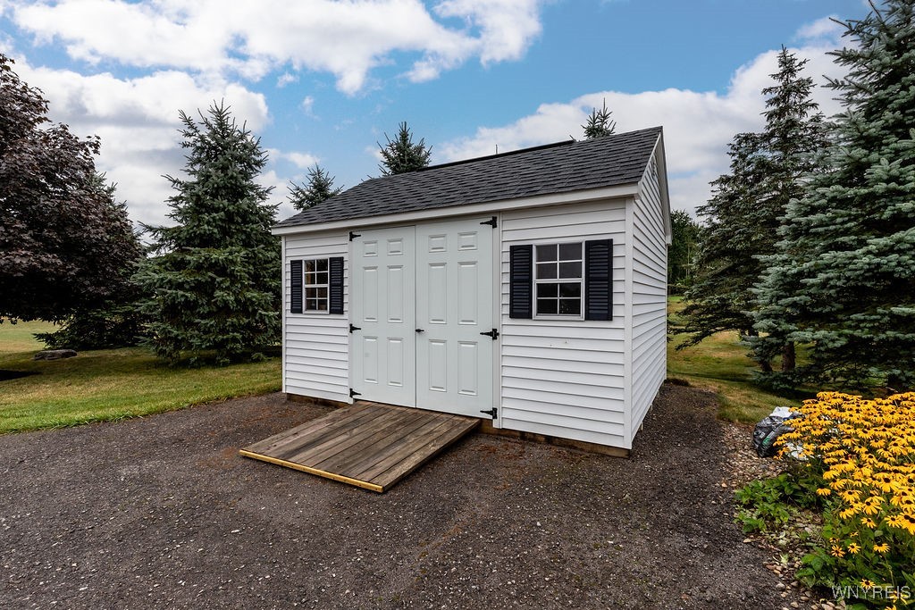 7960 Goodrich Road Clarence, NY 14032 - Photo 44 of 44 Shed located in front for convenience!