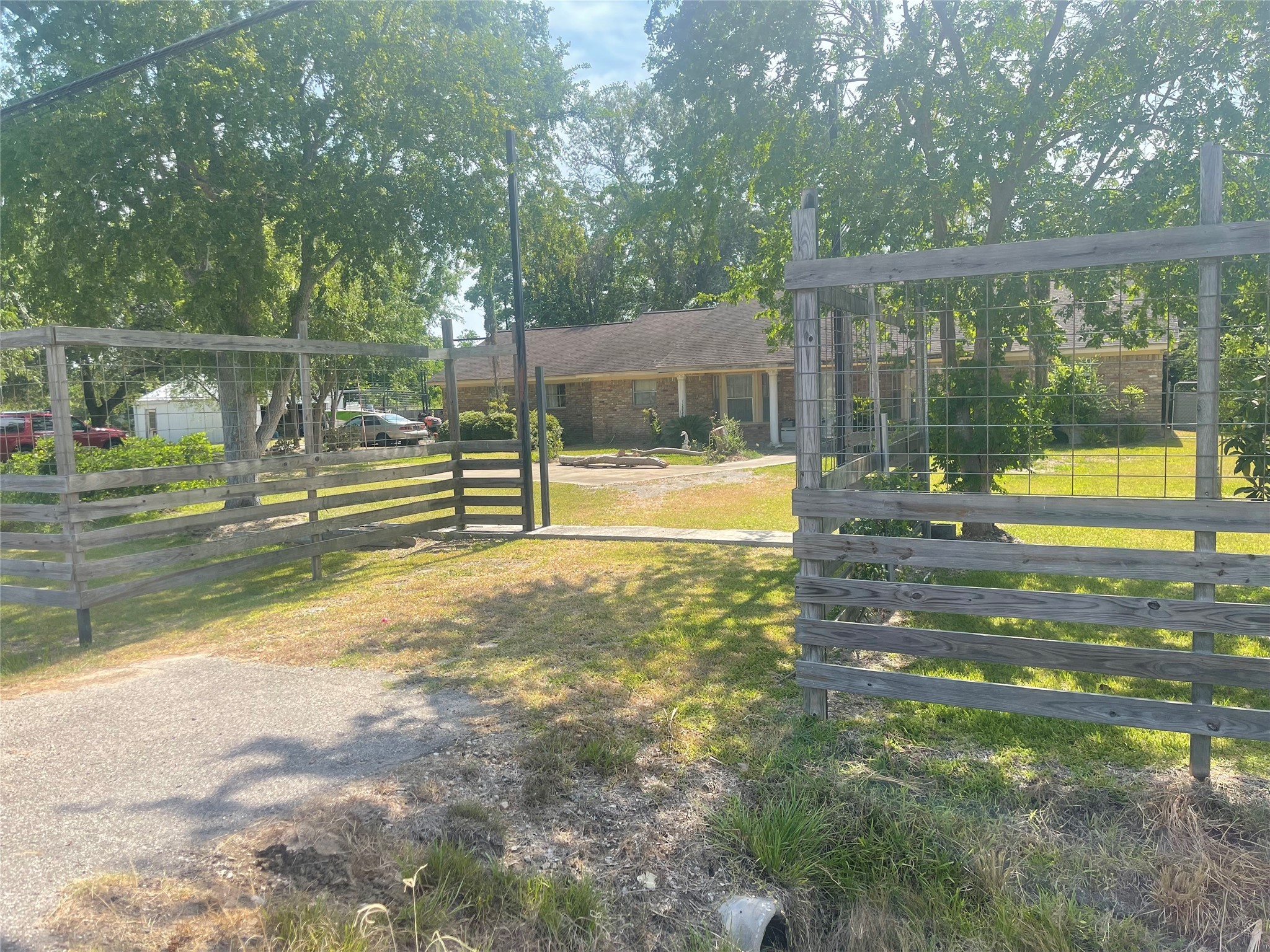 16719 McLean Road Pearland, TX 77584 - Photo 11 of 15 a view of a yard with swimming pool
